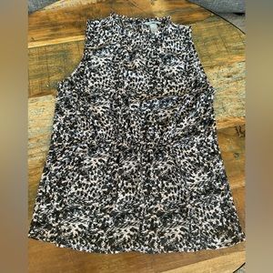 Sleeveless silky animal print peplum top